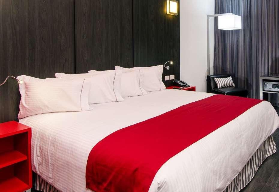 Ramada Encore By Wyndham Пуебла Номер фото