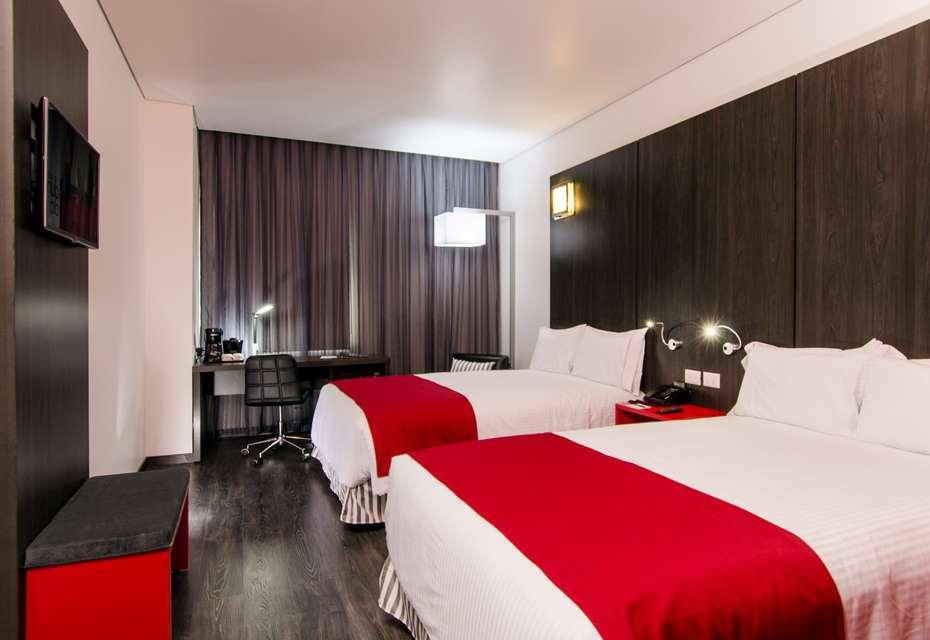 Ramada Encore By Wyndham Пуебла Номер фото